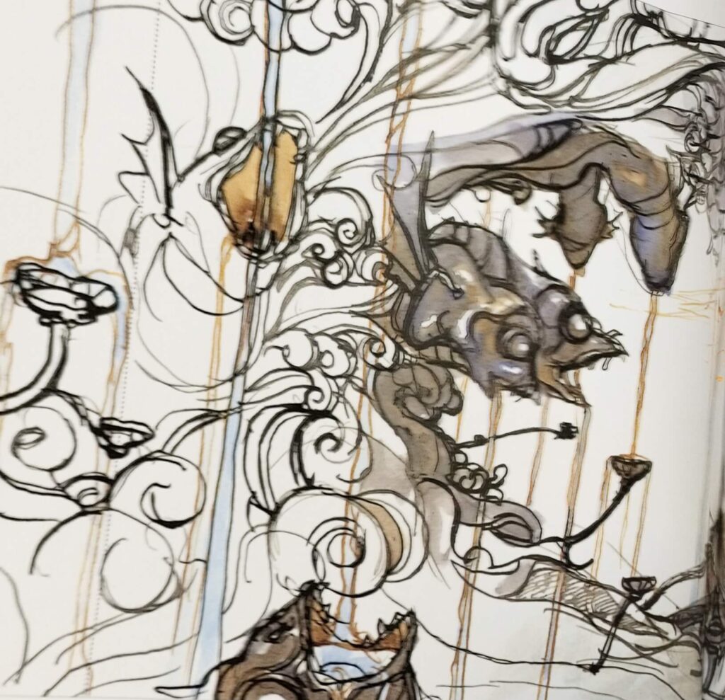 魚の銅像の口から噴き出る水